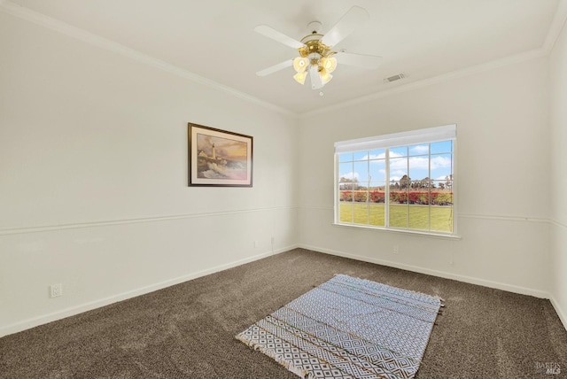empty room with visible vents, ornamental molding, carpet, and baseboards