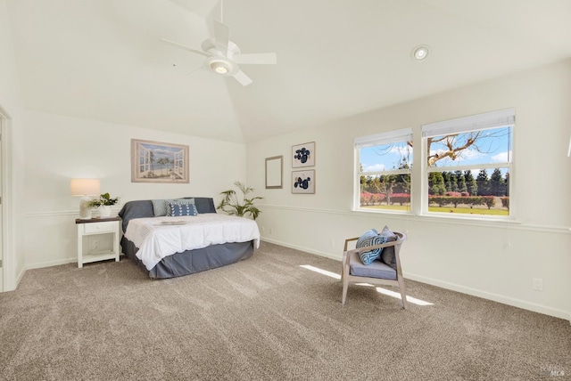 bedroom featuring a ceiling fan, baseboards, carpet, and high vaulted ceiling