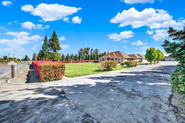 view of street featuring driveway