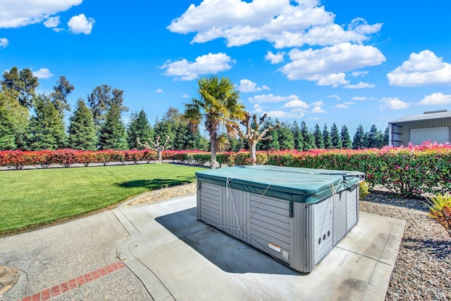 view of patio / terrace with a hot tub