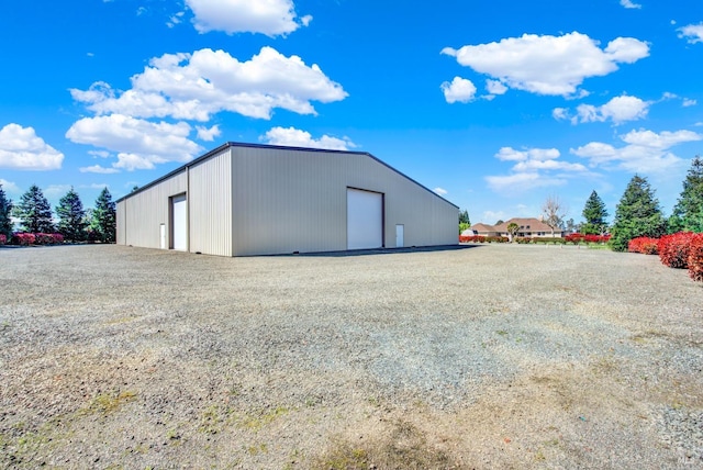 view of outbuilding featuring a garage