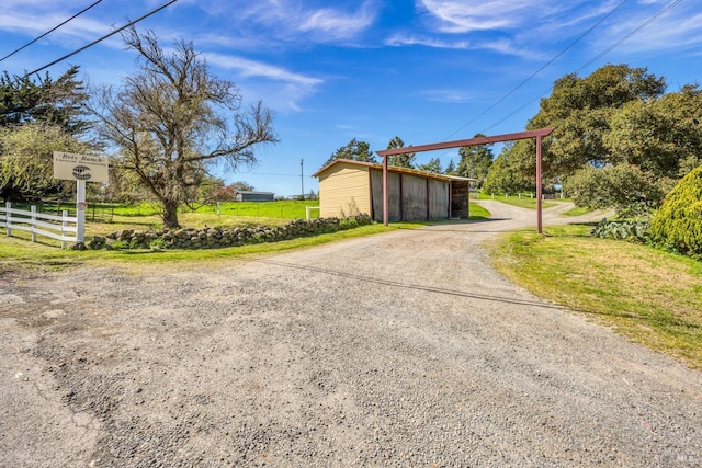 exterior space featuring gravel driveway