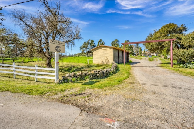 view of road featuring driveway
