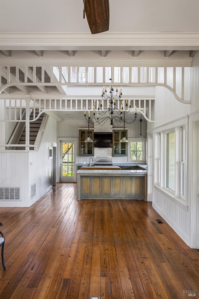 interior space with sink, a chandelier, and dark hardwood / wood-style flooring