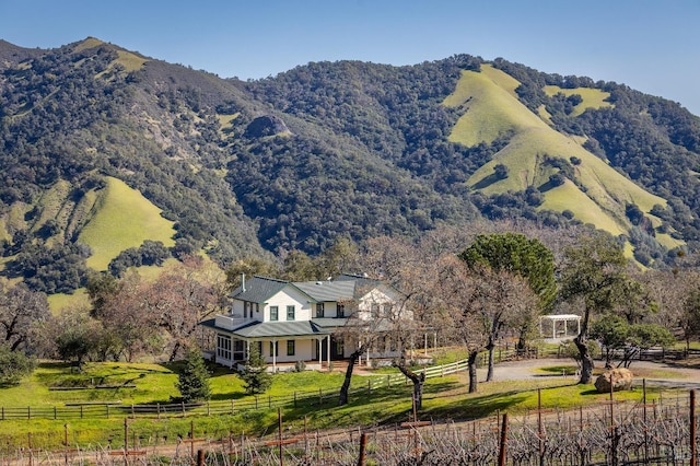 property view of mountains featuring a rural view