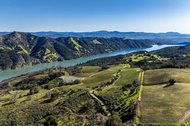 view of mountain feature featuring a rural view and a water view