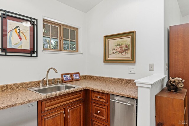 201 Pine Ridge Rd, Ukiah, CA 95482 - kitchen featuring a sink, light countertops, brown cabinets, and dishwashing machine