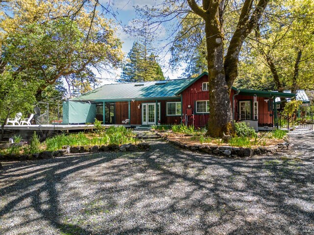 201 Pine Ridge Rd, Ukiah, CA 95482 - ranch-style house with board and batten siding and french doors