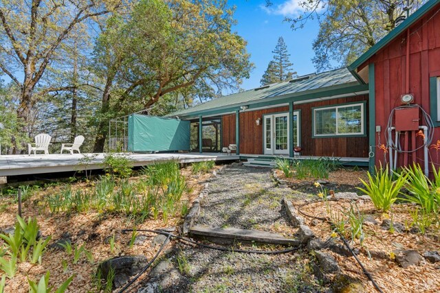 201 Pine Ridge Rd, Ukiah, CA 95482 - back of house featuring french doors, metal roof, and a deck