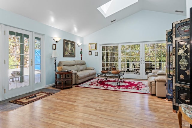 201 Pine Ridge Rd, Ukiah, CA 95482 - living area featuring visible vents, high vaulted ceiling, a skylight, and french doors