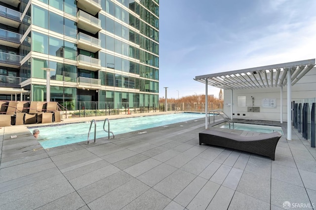 view of pool featuring a pergola and a patio