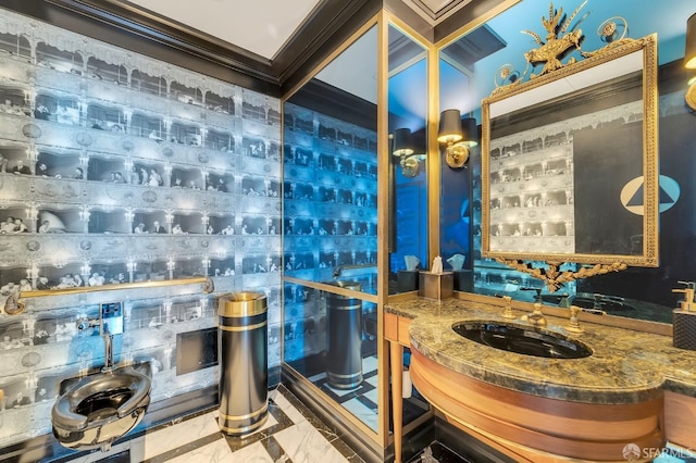 bar with ornamental molding, sink, and stone countertops