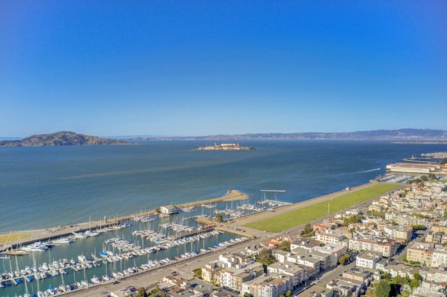 bird's eye view featuring a water and mountain view