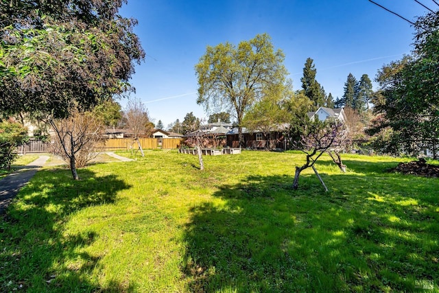 view of yard featuring fence