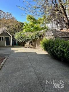 exterior space featuring an outbuilding and a patio