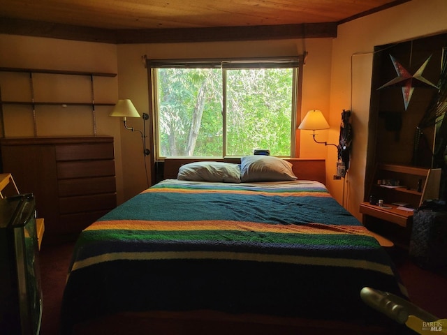 bedroom with wooden ceiling