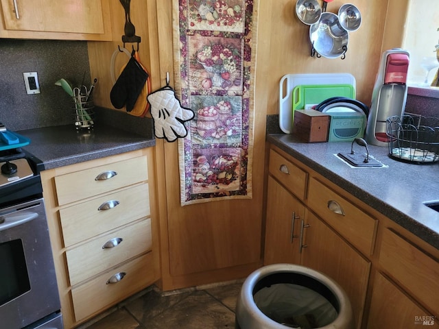 kitchen featuring decorative backsplash and electric stove