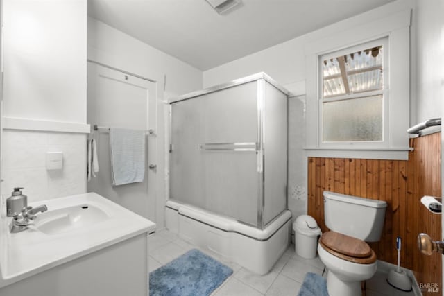 bathroom with tile patterned floors, vanity, and toilet