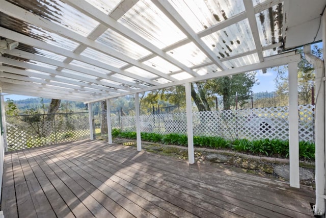 wooden deck featuring a pergola