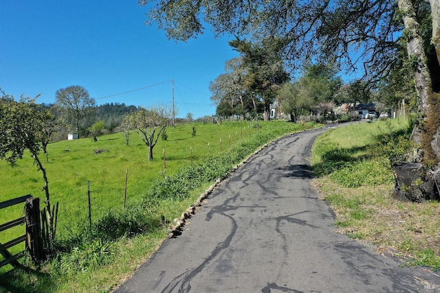 view of road with a rural view