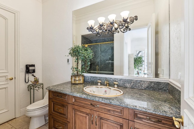 bathroom featuring crown molding, toilet, tile floors, and vanity