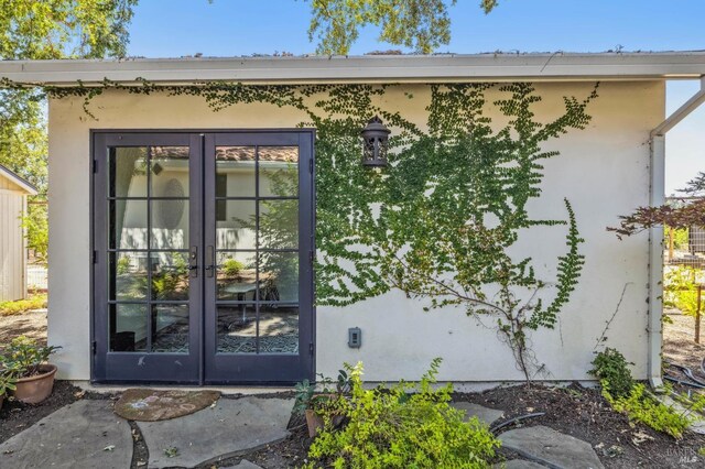 doorway to property with french doors