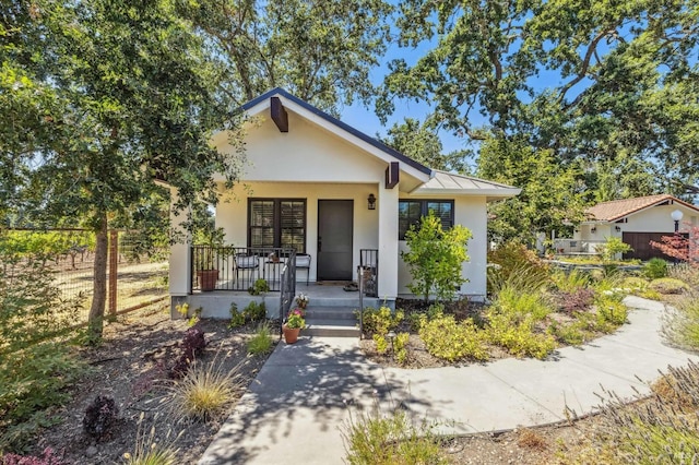 bungalow featuring a porch