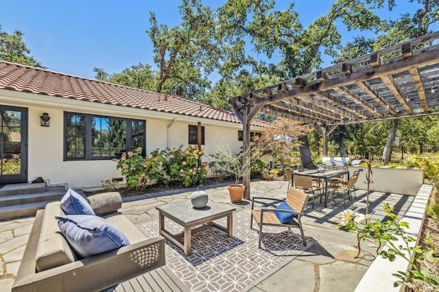 view of patio / terrace with an outdoor hangout area and a pergola