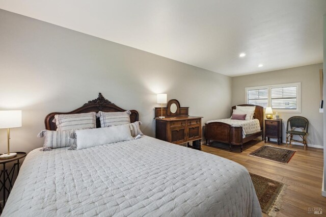 bedroom featuring light hardwood / wood-style flooring