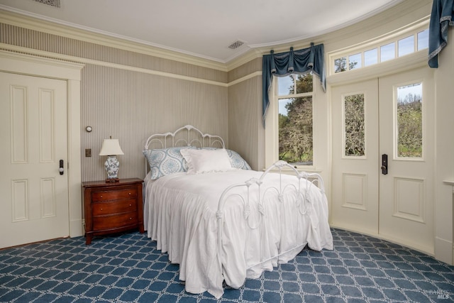 bedroom featuring crown molding