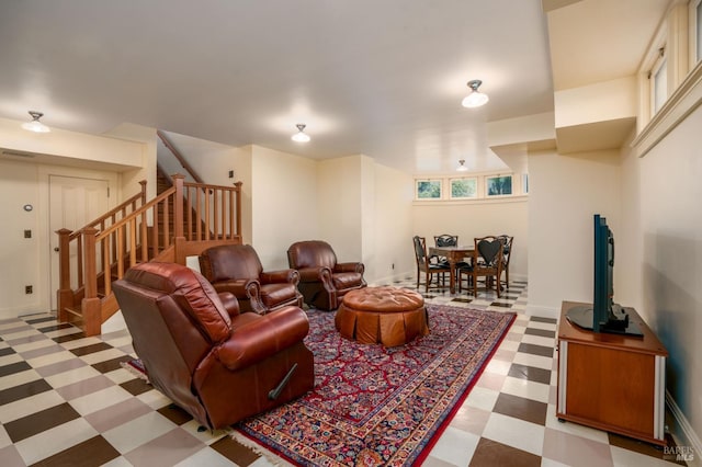 living room featuring light tile floors