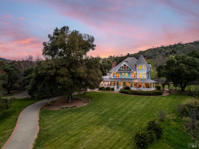 view of front of house with a lawn