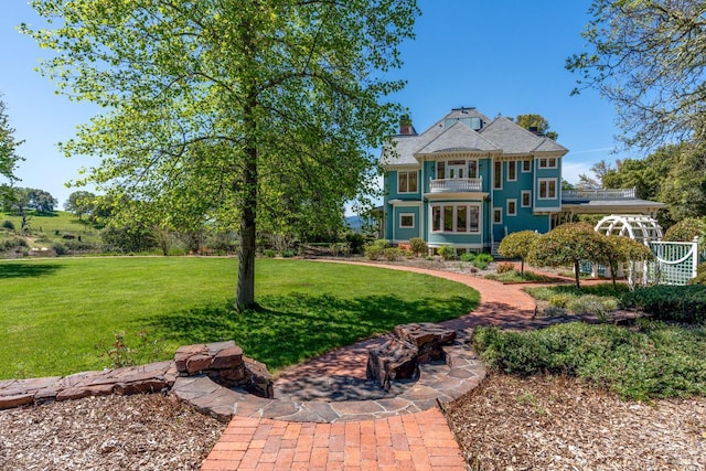 exterior space with a front lawn