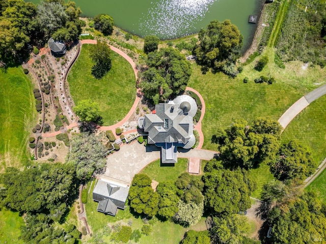 birds eye view of property featuring a water view