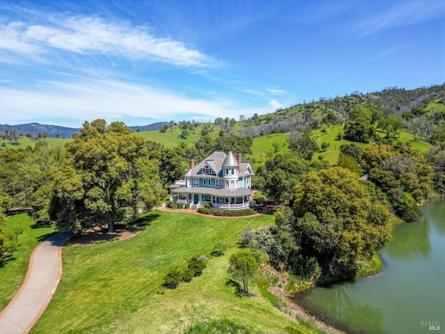 drone / aerial view featuring a water view