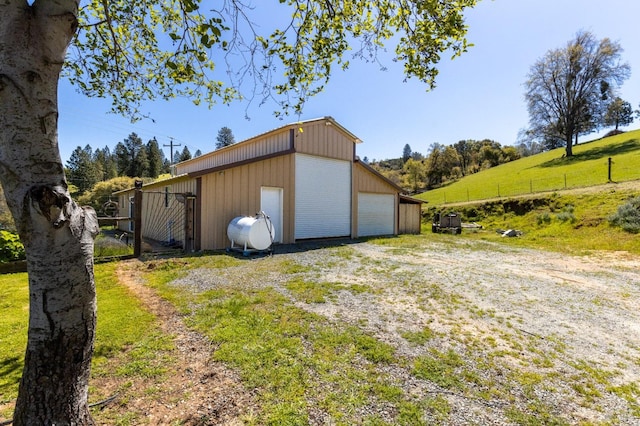 garage with a yard