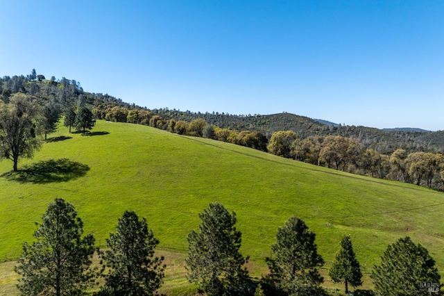 birds eye view of property with a rural view