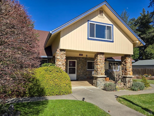 view of front of house with stone siding