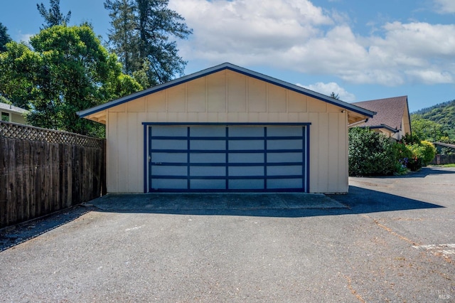 detached garage with fence