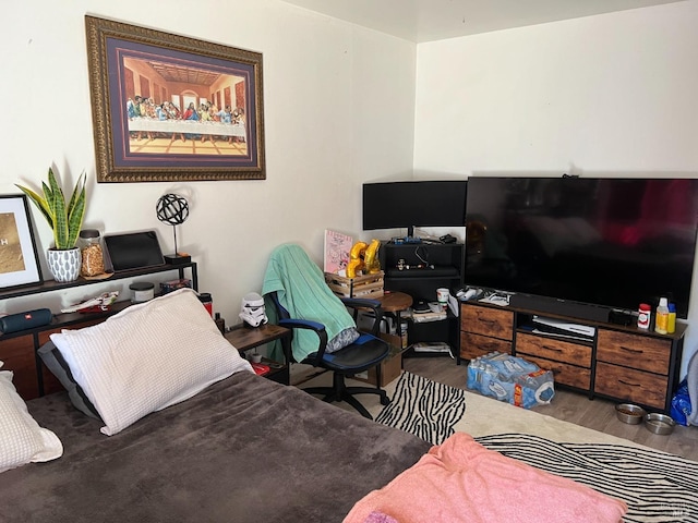 bedroom with wood-type flooring