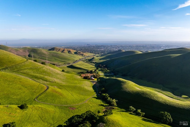 mountain view featuring a rural view