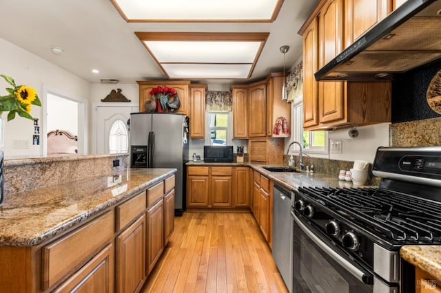 bathroom featuring vaulted ceiling, vanity, and tile flooring