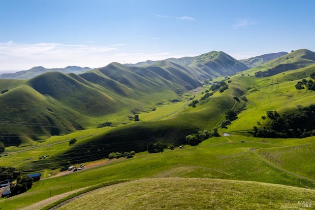 view of mountain feature with a rural view