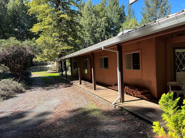 view of property exterior featuring a patio