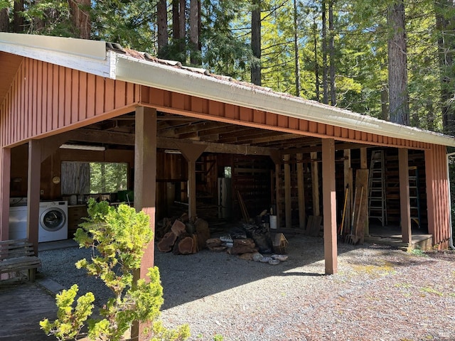 exterior space with washer and clothes dryer