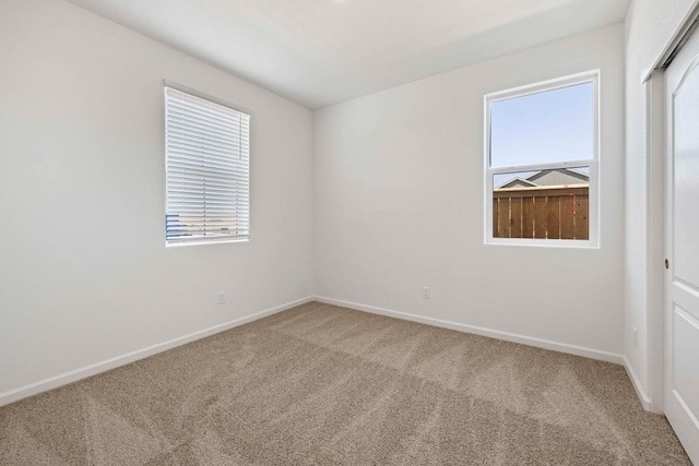 view of carpeted spare room