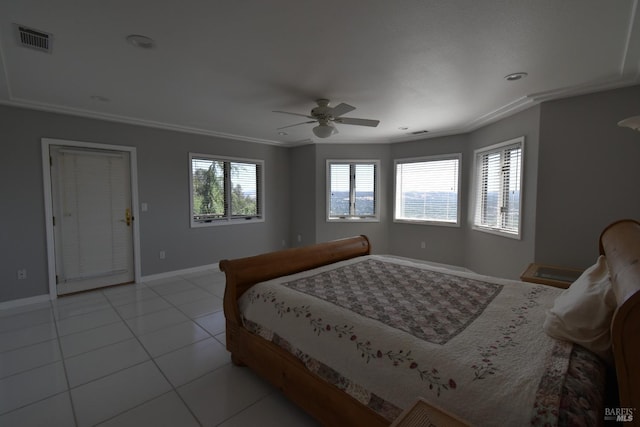 tiled bedroom featuring crown molding, multiple windows, and ceiling fan