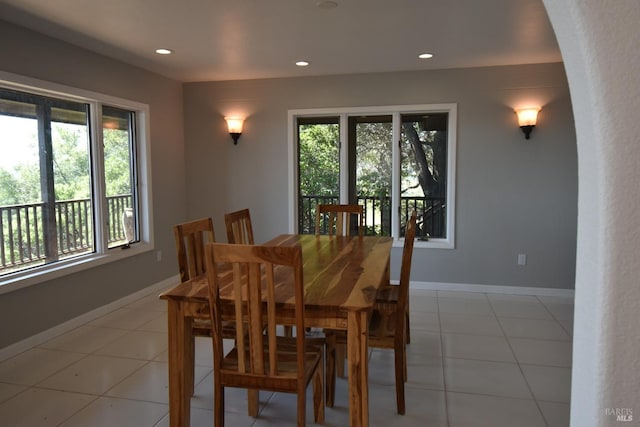 dining room featuring light tile floors