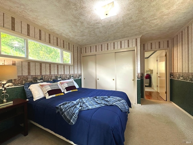 4013 Lakeview Dr, Nice, CA 95464 - bedroom featuring a textured ceiling, a closet, and carpet floors