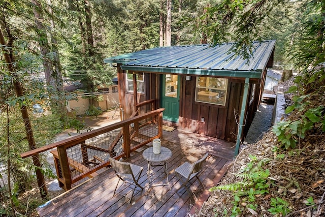 deck featuring an outdoor structure